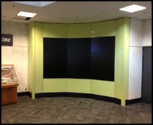 Curved demountable wall system installed in a corporate lobby